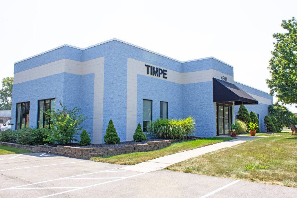 Exterior view of the light blue Timpe building with address 4801.